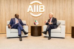 President William Ruto with the AIIB President and Board of Directors Chairman Jin Liqun
